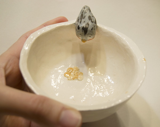 peanut-bowl-with-bird-and-its-food C
